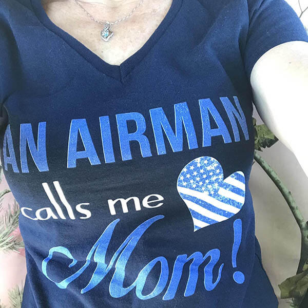 air force mom taking a selfie showing off her new graphic design t shirt