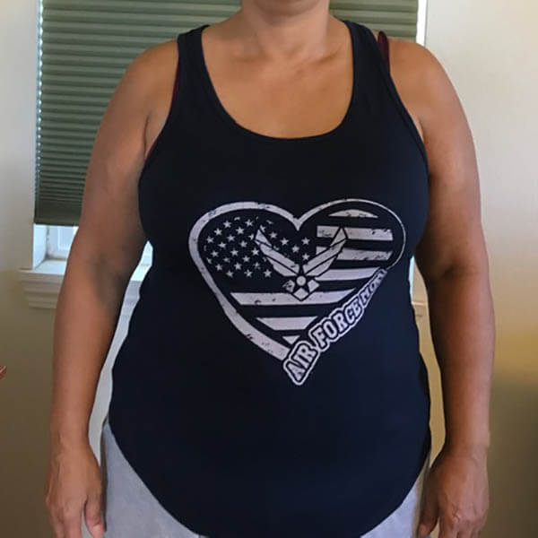 air force mom wearing a tank top with air force flag and heart design indoor