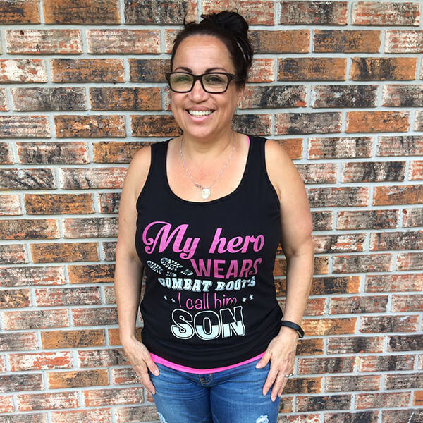 army mom wearing a black tank top showing her proud army mom design t-shirt