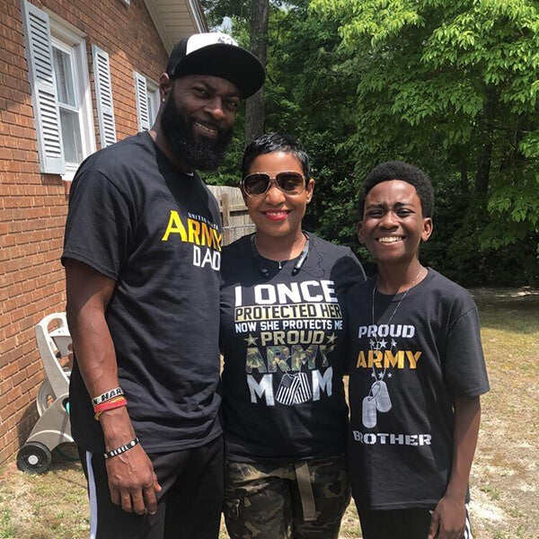 proud army mom with her army family outdoor